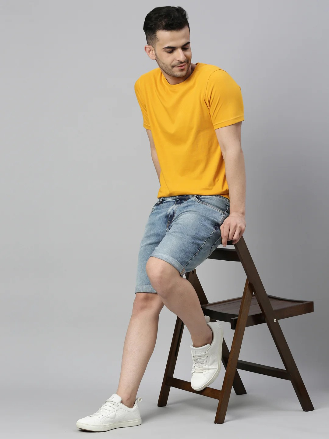 Model wearing Plain cotton tshirt Mustard Yellow